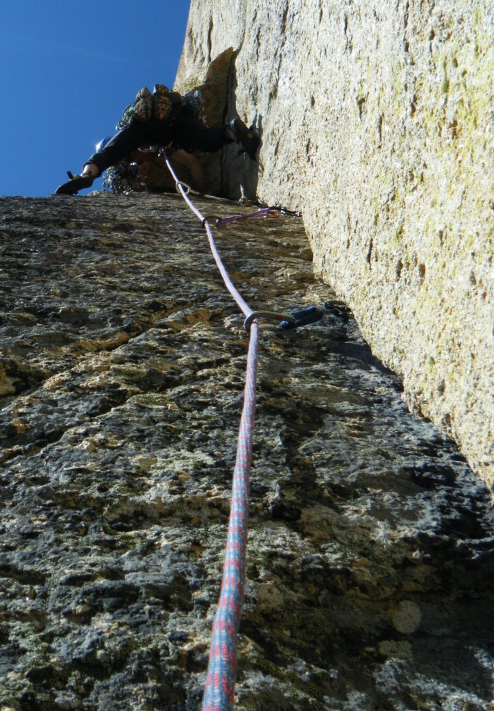 Tony navigates the small roof on the second fun corner pitch.